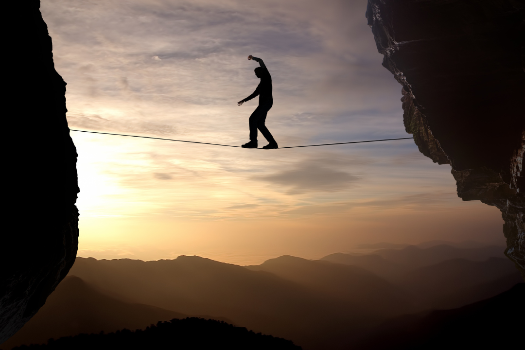 man_on_tightrope